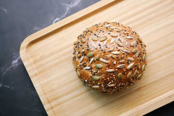 detail shot of sunflower seed baked bread on table 