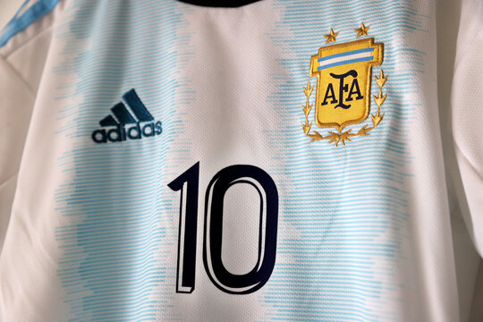 Argentina soccer jersey. Lionel Messi shirt. Number 10. light blue and  white. AFA logo. Argentine Football Association. Adidas. Shield. Soccer  player. Stock Photo | Adobe Stock