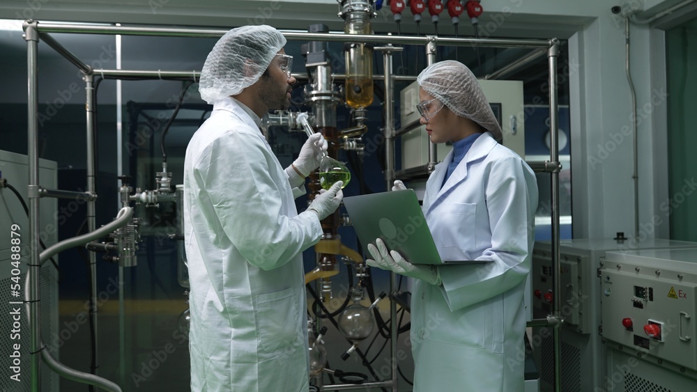 Poster two scientist in professional uniform working in laboratory for chemical and biomedical experiment