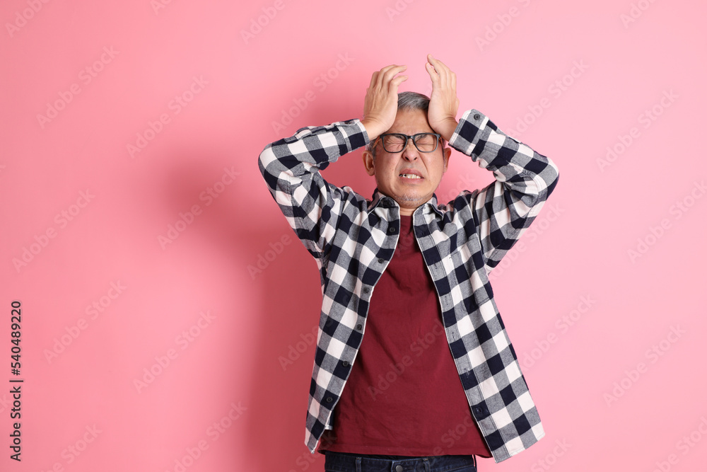 Wall mural Asian Man on Pink