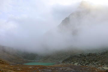 Mountain landscape of long distance hiking trail Tour Des Combins which crosses Switzerland to Italy via Bourg Saint Pierre, Fenetre Durand and Aosta Valley, TDC