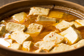 Dry roasted tofu pot on sackcloth