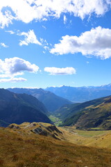 Fototapeta premium Mountain landscape of long distance hiking trail Tour Des Combins which crosses Switzerland to Italy via Bourg Saint Pierre, Fenetre Durand and Aosta Valley, TDC