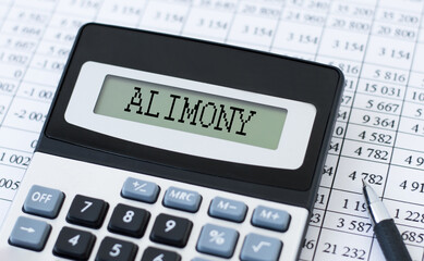 Calculator with text ALIMONY on dollars. Business, finance conceptual.