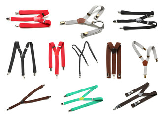 Collection of suspenders on white background