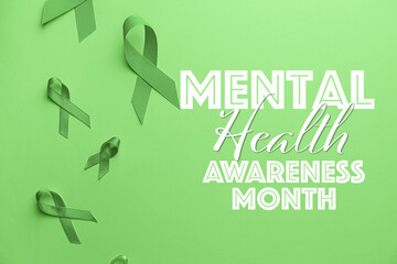 Green ribbons and text MENTAL HEALTH AWARENESS MONTH