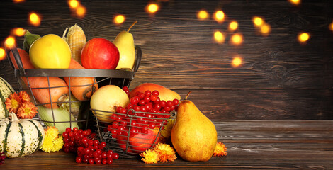 Fresh fruits and vegetables on wooden background with space for text. Harvest festival