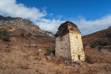 Old Egical towers complex, one of the largest medieval castle-type tower villages, located on the extremity of the mountain range in Ingushetia, Russia. Old family crypt.
