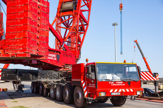 Constanta, Romania - 08.04.2022: A large Liebherr truck crane standing on the territory of the seaport.