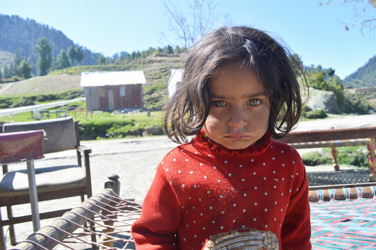 Portrait Of Indian Pakistani. Village Kashmiri Girl.