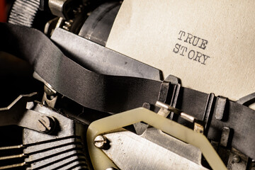 True Story typed words on a vintage typewriter.