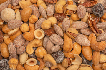 A group of almonds, pistachios, walnuts, macadamia, cashews.