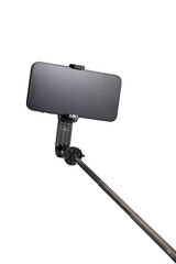 a selfie stick with an isolated phone without a shadow clipping contour, a mobile phone for the convenience of photographing, phone accessories on a white background are isolated
