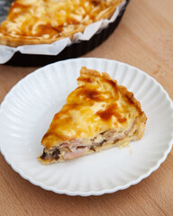 Homemade Quiche pie with ham and mushroom