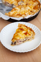 Homemade Quiche pie with ham and mushroom