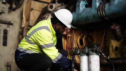 Portrait of maintenance engineer or apprentice in workshop of railway engineering facility