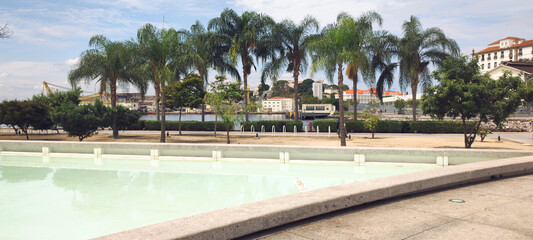 Mauá Rio de Janeiro square marine pier boats Igreja São Bento Franciscano landscape horizon monuments swimming pool lake water mirror leisure promenade family old buildings modern palm trees coconut t