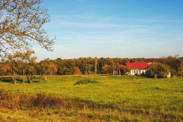 Peasant house in beautiful natural surroundings.Sunny autumn day.