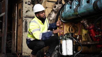 Portrait of maintenance engineer or apprentice in workshop of railway engineering facility