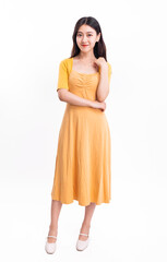 A beautiful, stylish woman in a yellow dress