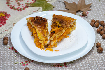 Slices of melon pie, pumpkin pie baked at home on a plate