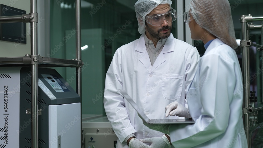 Poster two scientist in professional uniform working in laboratory for chemical and biomedical experiment