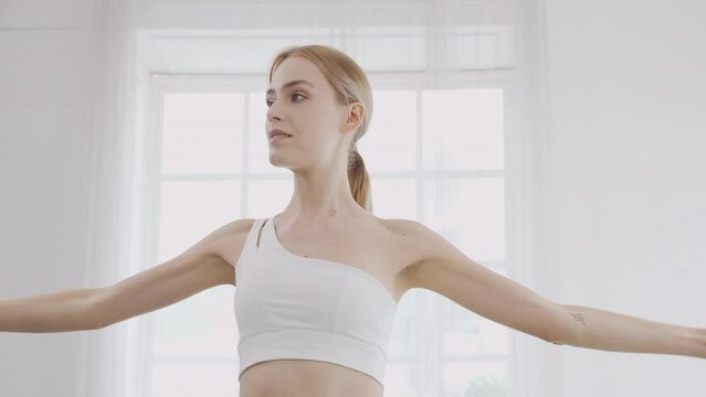 Beautiful young woman workout with lift up dumbbell for muscle while motivation and determined, one person, exercise and sport for muscular arm and hands, recreation and sport for health care concept.