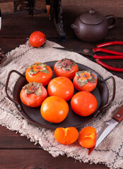 The fresh fruit of autumn, red persimmon