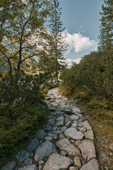Beautiful road in the mountains. Hiking trail in the Tatra mountains in Poland, Europe. The stone path to climb up to the top of the mountain.