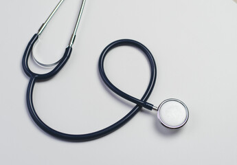 Stethoscope isolated on white, top view. Medical tool. Health care concept.