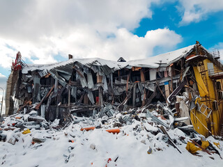 ruins of the destroyed supermarket building, destruction of illegal buildings