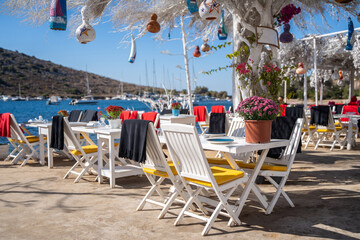 chairs and served table on the fancy beach restaurant