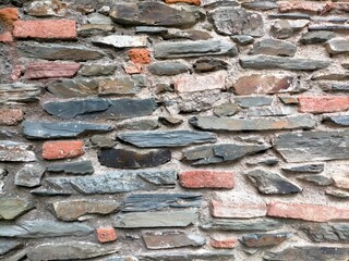 gray color modern style design pattern uneven broken real stone wall decoration with cement