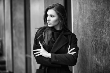 Girl in a coat black and white photo