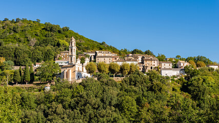 Fototapeta na wymiar Panoramic view of Pietra di Verde, a dreamy mountain village nestled in the mountains of Castagniccia. Corsica, France
