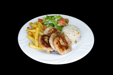 Grilled chicken meatballs with rice, salad and french fries in a white plate