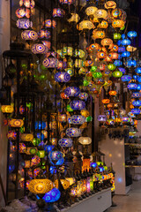 Obraz premium Colored lanterns on the background of the black night sky in the street