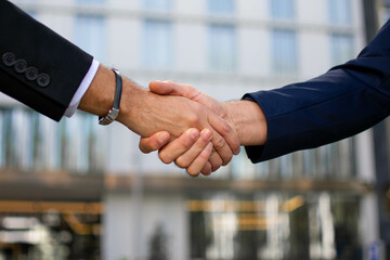 Man in suit and tie give hand as hello in office closeup. Friend welcome mediation offer positive...