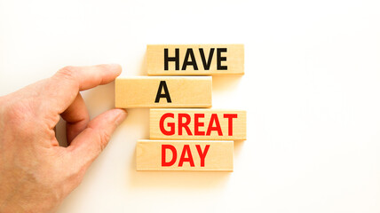 Have a great day symbol. Concept words Have a great day on wooden blocks. Beautiful white table white background. Businessman hand. Business, psychological Have a great day concept. Copy space.