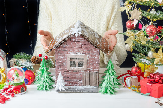 Step-by-step photo instructions for making a Christmas decor, step 9 - ready-made painted cardboard house