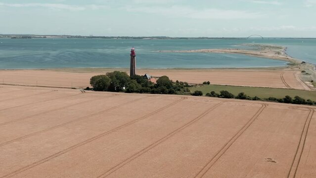Aerial view of a lighthouse on the Fehmarn island on a sunny day