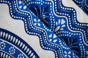 Blue and white decorative textile print detail.  