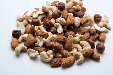 Various nuts on a white background close-up.