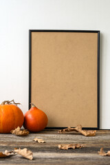 Frame, mockup. Pumpkin, Squash. Happy Thanksgiving Day wooden table, background decorated with pumpkins and autumn leaves garland. Holiday Autumn festival scene, Fall, Harvest. Halloween