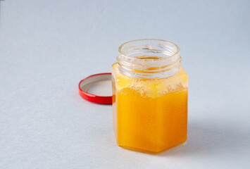 honey in a glass jar, copy space