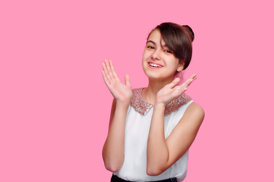 Happy brunete girl making with hands surprised gesture