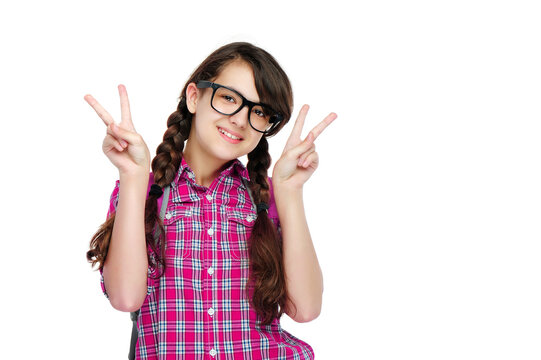 Pretty brunette girl making vicory gesture