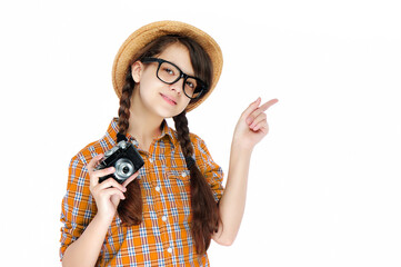 Teen girl photographer with old style camera pointing to the white background