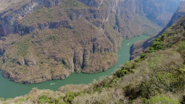 Beautiful top view of Sumidero Canyon in Chiapas Mexico with a boat rides on the river