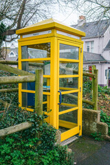  Yellow telephone booth on the street